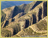 Rock strata in the Djebel Maadid, a natural fortress for the ancient Hammadid capital city, Al Qal'a of Beni Hammad (UNESCO world heritage site, near M'Sila, Algeria)