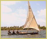 Traditional sailing dhow at Lamu Old Town (Kenya), one of the UNESCO world heritage sites along East Africa’s Swahili coast