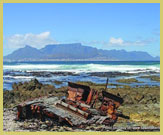 View of Cape Town and Table mountain from the shores of Robben Island (UNESCO world heritage site, South Africa)