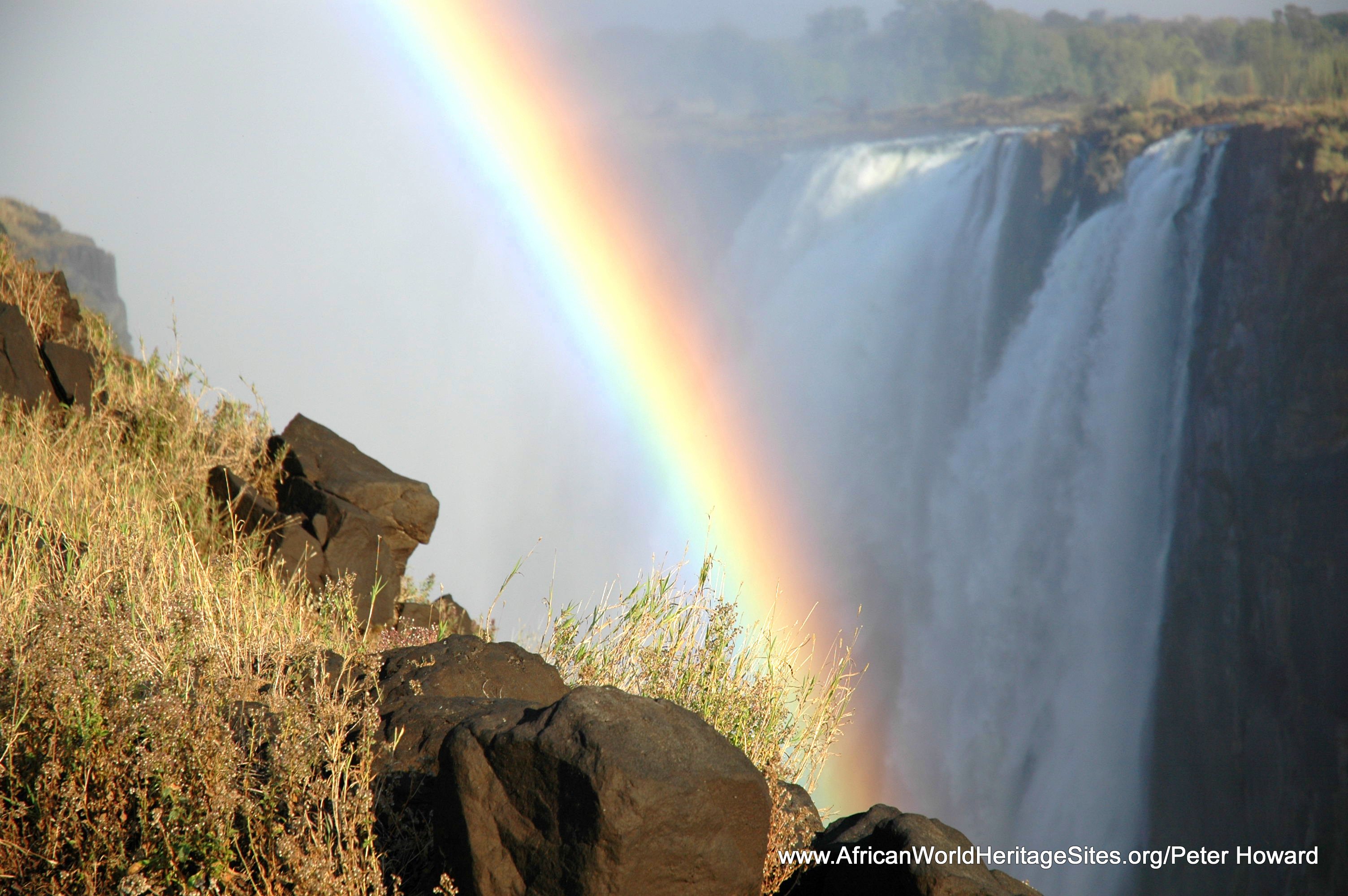 A rainbow created by the plume of spray generated by the waters of the Zambezi River at Victoria Falls/Mosi-oa-tunya