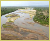 Meandering across a wide alluvial floodplain, the great Rufiji river cuts through the Selous Game Reserve world heritage site (Tanzania)