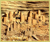 Traditional granaries built under shelter at the foot of the cliffs at the Cliff of Bandiagara - Land of the Dogons world heritage site in Mali