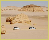 Visitors cars at Wadi Al Hitan (Whale Valley) world heritage site in the western deserts of Egypt