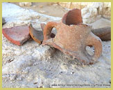 Broken pots testify to the export of 'Holy' water from the archaeological site of Abu Mena (UNESCO world heritage Site in Danger near Alexandria, Egypt)
