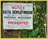 Signboard on the boundary of one of the Sacred Mijikenda Kaya Forests, a UNESCO world heritage site (cultural landscape) near Mombasa, Kenya