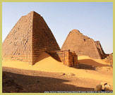 Many of the pyramids of the Kushite royal cemetery have been decapitated by treasure-hunters at the Archaeological Sites of the Island of Meroe UNESCO world heritage site, Sudan