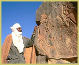 The famous 'fighting cats' engravings, one of the most iconic rock art images from anywhere in Africa, is found outside the area designated in the Tadrart Acacus as a UNESCO world heritage site