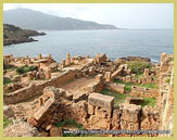 Located on the Mediterranean coast, Tipaza UNESCO world heritage site (Algeria) includes the ruins of the Roman port as well as a nearby necropolis and other archaeological remains
