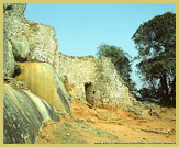 Dry stone wall construction incorporating natural granite boulders at the Great Zimbabwe National Monument UNESCO world heritage site, near Masvingo, Zimbabwe